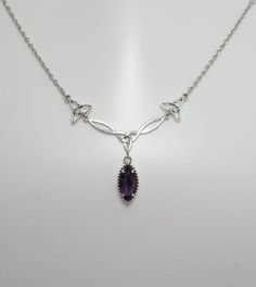 This is a new handmade necklace. It is made with antiqued silver plated Celtic knots, accented with a high quality DEEP VIOLET PURPLE glass jewel that sparkles like crystal. Decorated portion is 2 1/2" wide and 1 1/4" tall in the center. Necklace is adjustable 15-18" with a lobster clasp and chain extender. If you would like a different length, please send us a message.Matching earrings and headpiece are listed in our store in a variety of stone colors. If you don't see items with a color you wa Gothic Amethyst Necklace, Purple Gem Necklace, Nickel Free Oval Necklace For Wedding, Nickel-free Oval Necklace For Wedding, Nickel-free Oval Wedding Necklace, Antique Silver Oval Necklace For Wedding, Dark Amethyst, Celtic Goddess, Goddess Jewelry