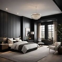 a bedroom with black walls and white bedding in the center is lit by a crystal chandelier