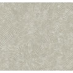 a beige wallpaper with wavy lines on it