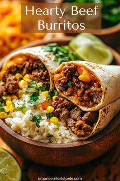 two burritos filled with meat, rice and cilantro on a wooden plate