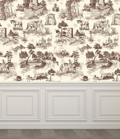 a wallpapered room with an animal theme on the wall and wooden flooring