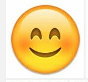 an emoticive smiley face with two eyes and one eye closed to the side