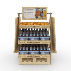 a wooden display case filled with oranges and bottled water