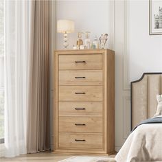 a bedroom scene with focus on the chest of drawers