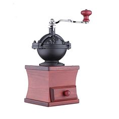 an old fashioned faucet is on top of a wooden stand with red knobs