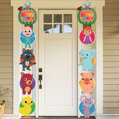 a front door decorated with cartoon characters on it's sides and hanging from the side