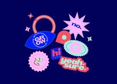 various stickers and decals on a dark blue background, including the words gro or oh