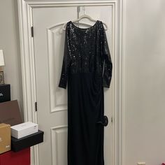 Black Cold Shoulder Gown, Never Worn Black Long Sleeve Gown For Dinner, Black Sequin Dress For Dinner, Fitted Black Maxi Dress For Holidays, Black Sequin Dinner Dress, Black Holiday Maxi Dress For Night Out, Black Maxi Dress For Holiday Night Out, Holiday Black Maxi Dress For Night Out, Black Sequin Evening Gown, Black Gown For Night Out Party Season