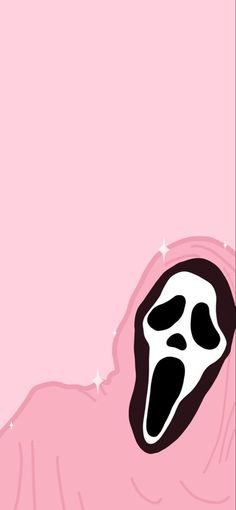 a pink background with a black and white mask on it