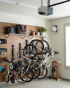 there are many bikes hanging on the wall in this bike storage area, and it's easy to put together