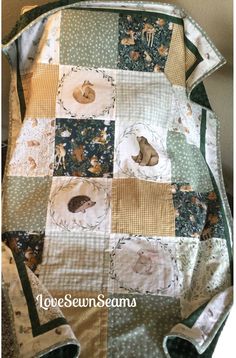 a quilted blanket with animals on it