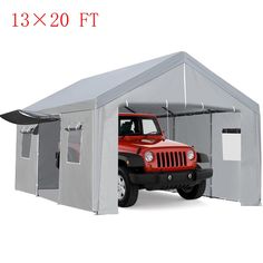 a red jeep is parked in front of a gray tent with the door open to it