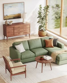 a living room filled with furniture and a large window