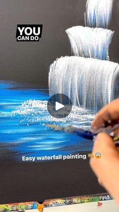 someone is painting a ship with watercolors on the canvas and then using it to paint