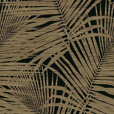 a black and gold rug with palm leaves on it