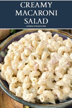 creamy macaroni salad in a bowl with text overlay