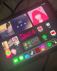 an ipad with various app icons displayed on the screen