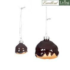 pair of chocolate frosted donuts hanging from silver earwires on white background