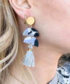 Accessories are a girls best friend! These Tassel Dangling Earrings are a fashion piece all of their own! Pair with almost anything to complete the perfect head turning look! 
* Approx: 3.3"
* Material: Zinc, Brass, Gold plated, polymer clay, tassels
* Lead Compliant, Nickel Free
* To prevent tarnish, please avoid wet substances Trendy Adjustable Tassel Earrings, Blowing In The Wind, Dangling Earrings, Brass Gold, Girls Best Friend, The Wind, Tassels, Polymer Clay, Dangle Earrings