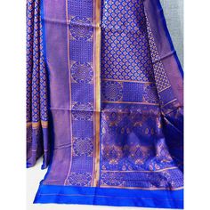 Blue colored saree is made from banarasi silk fabric which is highlighted with beautiful weaving work as shown. Comes along with unstitched banarasi silk blouse piece which you can customise as per your design/style. Occasion - You can wear this saree for festivals and functions. Note:- the actual product may differ slightly in color and design from the one illustrated in the images when compared with computer or mobile screen. Measurements: Saree : Banarasi Silk : 5.5 Mtrs Blouse : Banarasi Sil Blue Chanderi Pre-draped Saree With Motifs, Blue Art Silk Pre-draped Saree With Traditional Patterns, Blue Jamawar Pre-draped Saree With Zari Weaving, Blue Pre-draped Saree With Zari Weaving, Blue Pre-draped Saree With Motifs For Festivals, Blue Bollywood Banarasi Silk Pre-draped Saree, Semi-stitched Royal Blue Traditional Wear With Zari Weaving, Royal Blue Semi-stitched Traditional Wear With Zari Weaving, Art Silk Traditional Wear In Royal Blue For Puja