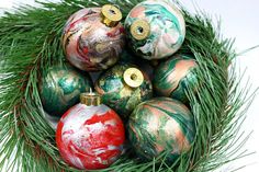 an arrangement of christmas ornaments in a wreath