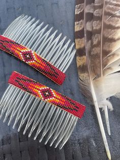 Beautifully beaded hair combs, perfect for holding your hair back with style and adding some colour. Gorgeous colours and design, timeless. Red beaded background with white, black and yellow accents. Native American Hair, Beaded Hair Combs, Silk Purse, Beaded Hair, Western Accessories, Hair Back, Native American Beading, Belt Purse, Brooch Necklace