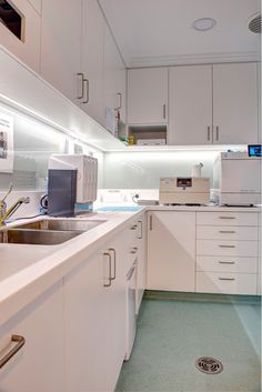 the kitchen is clean and ready to be used for work or dinnertime, as well as other things