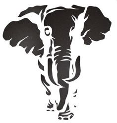 an elephant with tusks is shown in the shape of a stencil