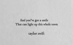 the words taylor swift are written in black ink on white paper, with an image of a