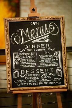 a chalkboard sign with the menu for a restaurant on it's easel