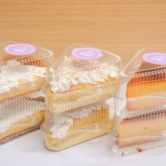 four plastic containers filled with different types of desserts