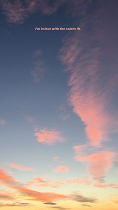 an airplane is flying in the sky at sunset or dawn with some clouds above it