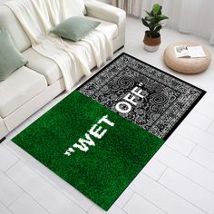 a living room area rug with the word power on it in white and green grass