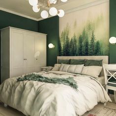 a bedroom with green walls and white furniture