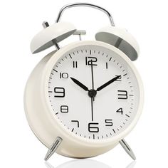 an alarm clock is shown on a white background