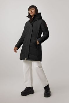 One of our most-loved styles, the Lorette Parka, gets an update with streamlined hood details, elevated trims, and additional inside pockets. Conquer fluctuating temperatures in this sophisticated parka with elaborate quilt-through detailing. Customize your parka and extend the coverage of your hood with a variety of our interchangeable Hood Trim accessories. Men Parka, Heavy Jacket, Baby Outerwear, Mens Parka, Womens Parka, Snow Pants, Waist Pack, Range Of Motion, Black Label