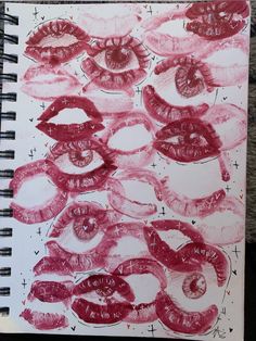 a spiral notebook with red lips drawn on the pages and some writing underneath it that says,