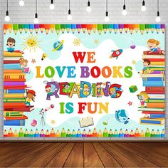 we love books reading is fun poster on the wall in an empty room with wooden floors