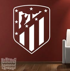 a wall decal with the emblem of an american soccer team in white on a red background