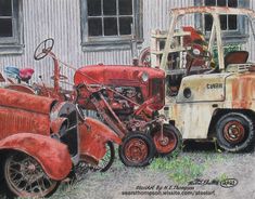 an old red truck parked next to another rusted car in front of a building