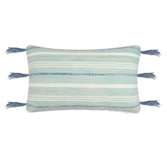 two blue and white striped pillows with tassels