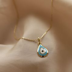 14k Real Solid Gold Turquoise Blue Enamel Evil Eye Drop Pendant Minimalist Designed Necklace Dainty Gift for Women Modern Valentine's Day ⓂMaterials & Specifications : Chain Lengths : 42 cm (16.5 in) 44 cm (17.3 in) 46 cm (18.1 in) 48 cm (18.8 in) Evil Eye Drop Pendant Width : 7 mm (0.27 in) Evil Eye Drop Pendant Length : 1.2 cm (0.47 in) Blue Clavicle Chain Jewelry As Gift, Blue Clavicle Chain Jewelry For Gifts, Blue Clavicle Chain Jewelry Gift, Yellow Gold Teardrop Charm Necklace, Yellow Gold Teardrop Necklace With Charms, Blue Gold-plated Tarnish-resistant Jewelry, Blue Tarnish-resistant Gold-plated Jewelry, Blue Gold Plated Necklaces As Gift, 14k Gold Blue Clavicle Chain Jewelry