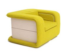 a yellow chair sitting on top of a white floor