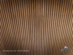 an overhead view of a bathroom with wooden slatted walls