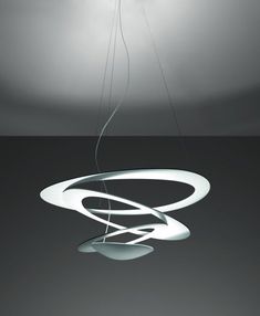 a modern light fixture hanging from the ceiling