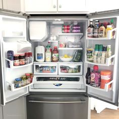 an open refrigerator with its door wide open