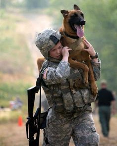 a soldier holding a dog in his arms and the caption says, some friends are worth carrying