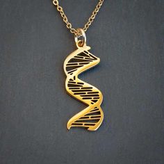 If you work with, study, or have genetic material, then this DNA necklace is for you. If you look closely, you will see the major and minor grooves, as well as a representation of base pairing. Pick your favorite metal color: a polished silver steel DNA pendant on an 18 inch sterling silver chain or a gold steel DNA pendant on an 18 - 20 inch adjustable gold plated steel chain. Perfect for: Biologists, microbiologists, biochemists Biophysicists, geneticists Doctors, nurses, medical students Scie Dna Necklace, Biology Jewelry, Medical Pendant, Microbiology, Medical Students, Steel Chain, Metal Color, Sterling Silver Chain, Sterling Silver Chains