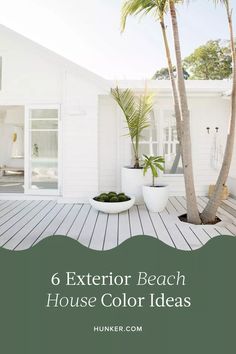 a white house with palm trees and the words 6 exterior beach house color ideas