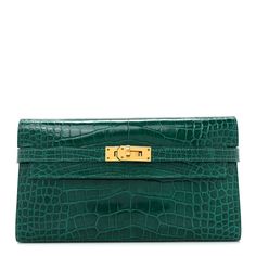 This is an authentic HERMES Shiny Alligator Kelly Wallet Longue in Vert Emeraude. This stylish shoulder bag is finely crafted of alligator leather in bright green. The bag features polished gold plated hardware. This opens to a partitioned smooth leather interior with card slots, patch pockets, and a zipper compartment. Luxury Green Wallet, Green Designer Bag, Hermes Kelly Wallet, Green Clutch Bag, Kelly Wallet, Kelly Hermes, Green Clutches, Hermes Wallet, Kelly Bag